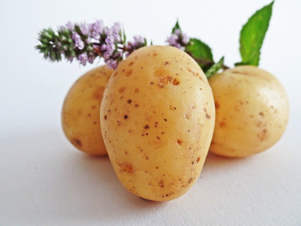 three clean potatoes