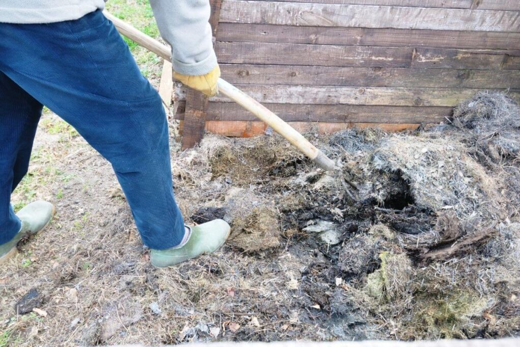 turning a compost pile