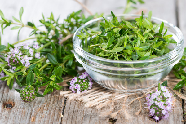 a bowl of winter savory leaves