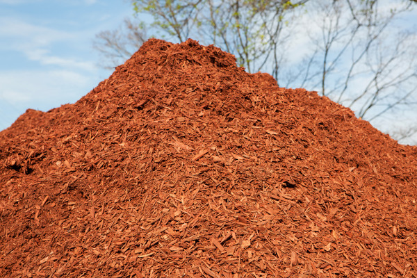 a pile of red mulch