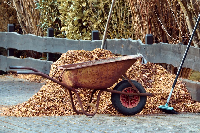 a wheelbarrow full of mulch