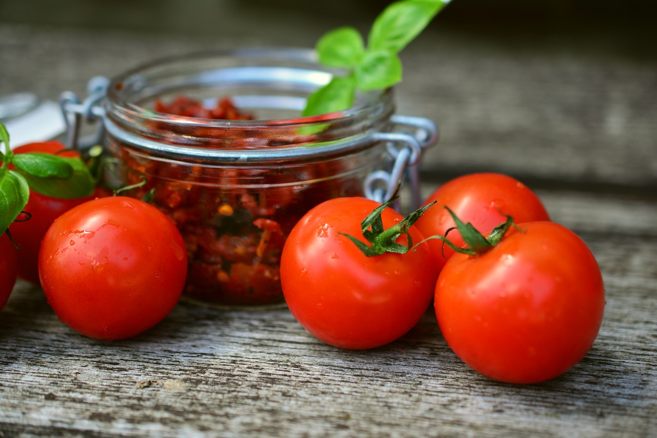 tomatoes near a bowl